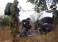 Car set ablaze, child injured in settler attacks rocking Al-Khalil