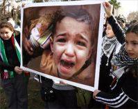 Gaza orphans demonstrate against siege as congressman enters the Strip