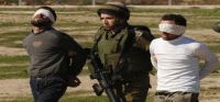 IOF troops round up three Palestinians, one wanted by PA