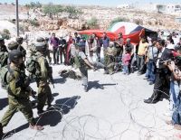 Clashes in Shafat refugee camp result in casualties.