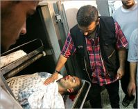 Israel escalates air strikes on Gaza, wounds two in night raids