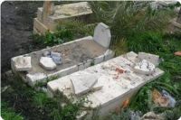 Jewish settlers destroy tombstones in West Bank cemetery.
