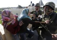 IOF troops assault Palestinian women and children