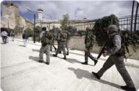 IOF soldiers turn Al-Khalil's Old City into army barracks