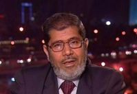 Morsy: Ruling regime must commit itself to respect the nation's call for reform