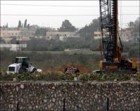 IOF troops damage more Palestinian land, round up West Bankers